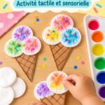 Un enfant s'amusant à créer une glace en coton colorée avec des matériaux de bricolage.